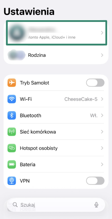 iPhone Settings screen with Apple ID option highlighted.