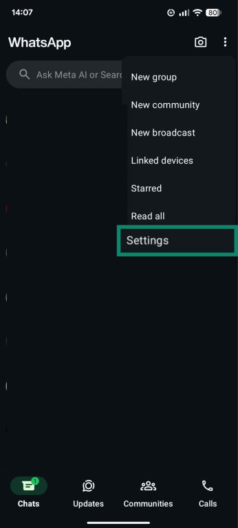 A screenshot of the WhatsApp app, showing the menu and the Settings button.