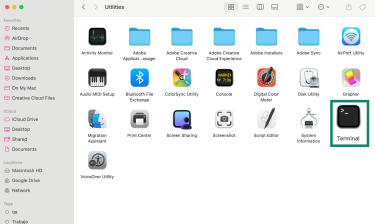 Mac Utilities folder showing Terminal app icon.