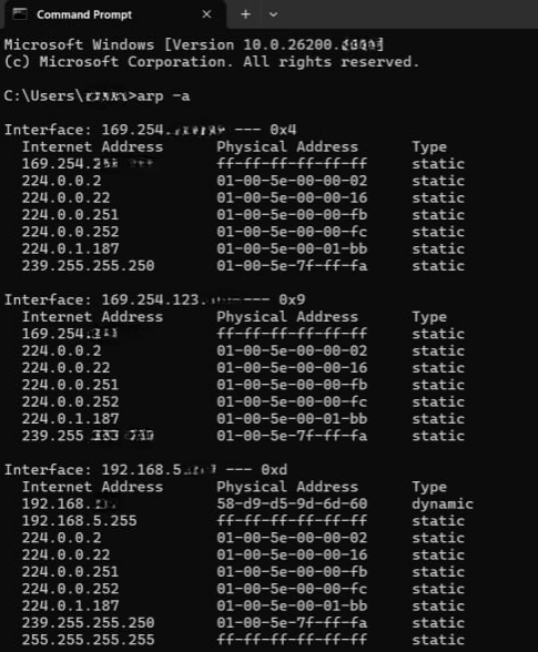 The "arp-a" command in Command Prompt on Windows.