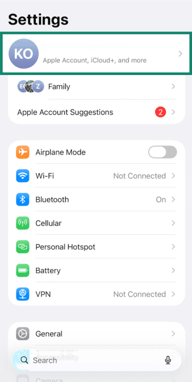iPhone Settings with Apple Account name section highlighted.