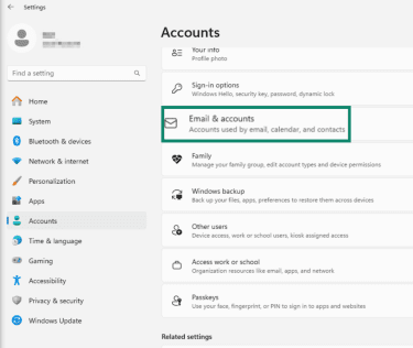 "Email & accounts" option highlighted in the Windows 11 account settings.